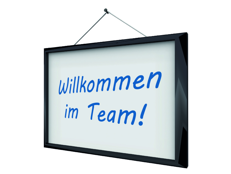 Schild mit der Aufschrift "Willkommen im Team" Schild mit der Aufschrift "Willkommen im Team"